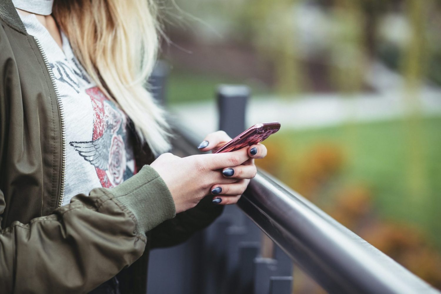 woman holding smartphone