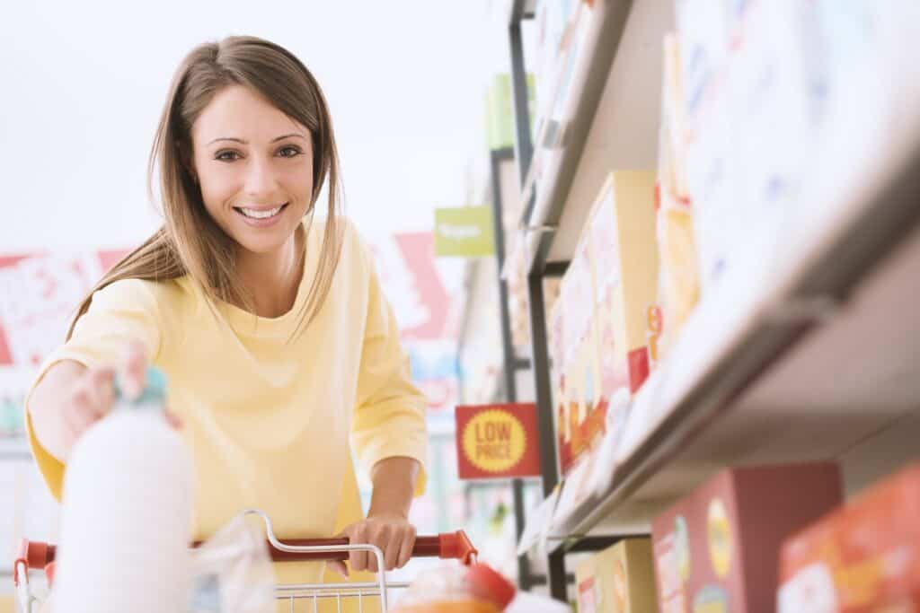 woman shopping with coupons for free stuff